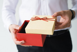 closeup business man opening gift box 1262 17824