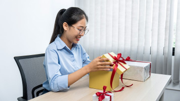 asian girl holding gift box for special one and lo 2023 11 27 05 15 15 utc